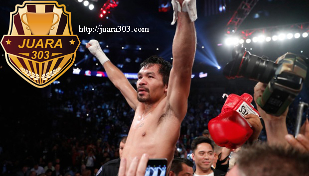 Manny Pacquiao menjadi juara dunia